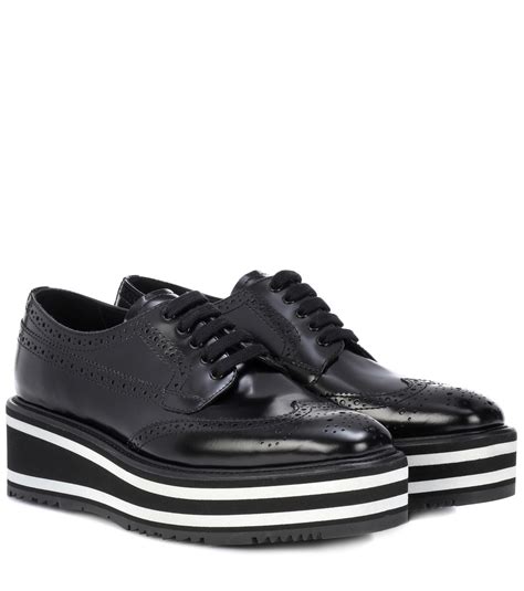 prada platform leather wingtip brogues